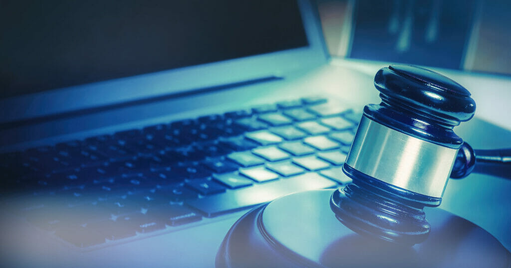 Gavel near a laptop